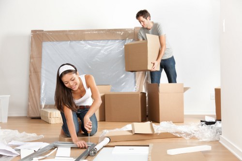 Team member loading items safely into a moving van