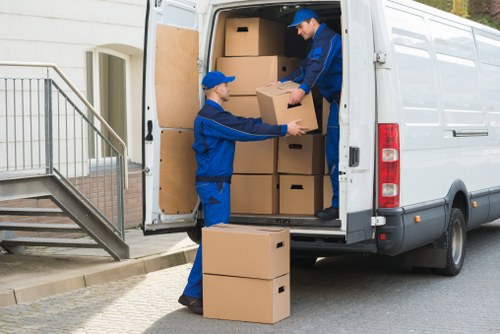 Removal team planning a move in a Mayfair residential street