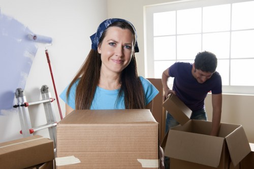 Careful packing of fragile household items for a Mayfair home move